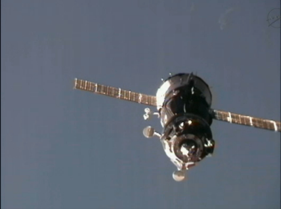 The Russian Soyuz TMA-03M pulls up to the International Space Station on Dec. 23, 2011 to deliver three new members of the orbiting lab&#039;s crew.