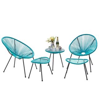 A blue egg bistro set with rope effect detail and a table