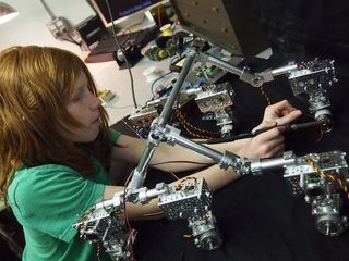Genevieve Beatty Solders Wires on the Mars Rover