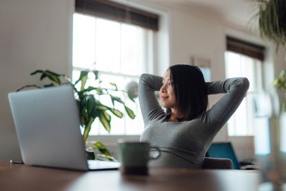 woman taking a break while working at home