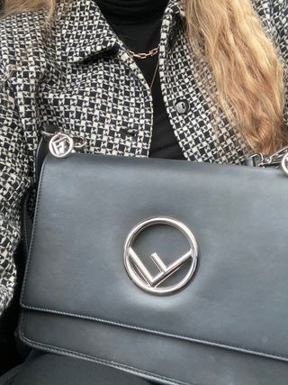 Florrie wears a Fendi bag