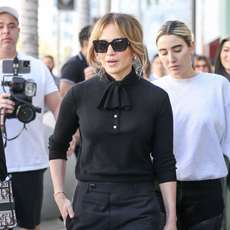 jennifer lopez is seen leaving gucci osteria in beverly hills wearing an all black outfit with ballet flats