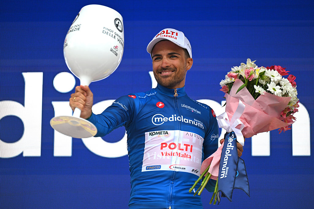 BURGAS, BULGARIA - MAY 08: Diego Pablo Sevilla of Spain and Team Polti VisitMalta celebrates at podium as Blue Mountain Jersey winner during the 109th Giro d&amp;amp;apos;Italia 2026, Stage 1 a 147km stage from Nessebar to Burgas / #UCIWT / on May 08, 2026 in Burgas, Bulgaria. (Photo by Tim de Waele/Getty Images)