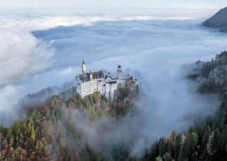 Drone shot of castle on a hill