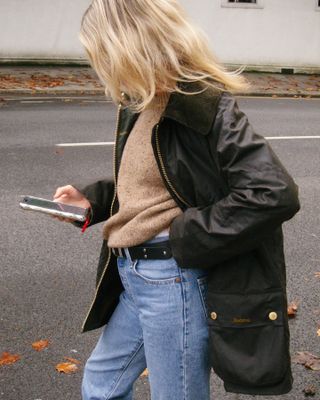 Lucy Williams wearing a Barbour barn jacket