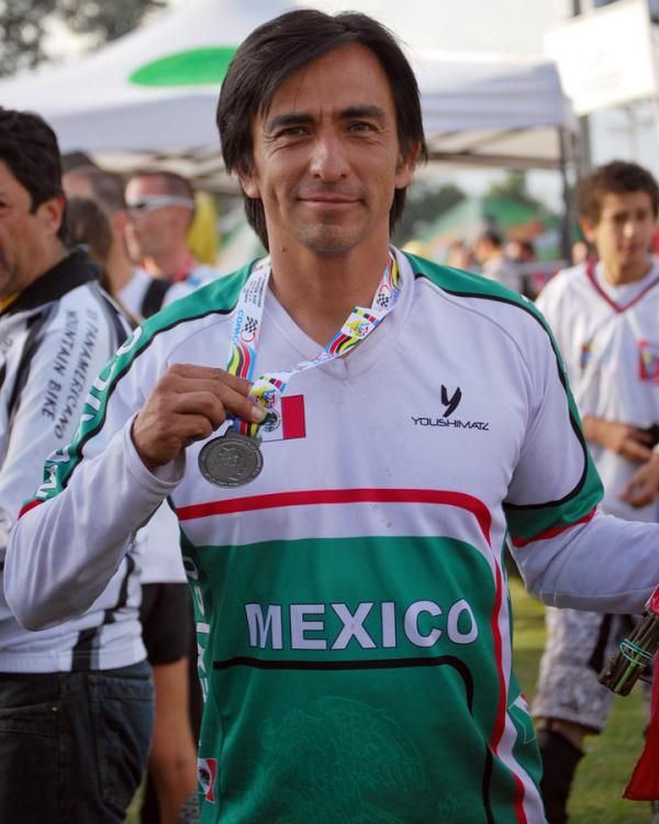 Jose Jacques poses with his medal.