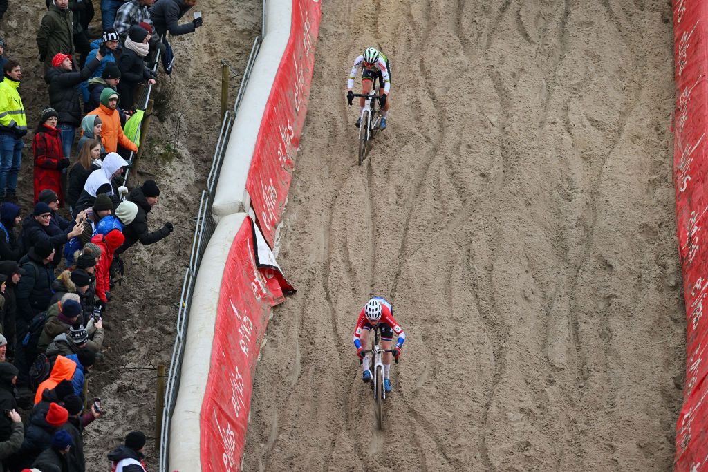 ZONHOVEN BELGIUM JANUARY 07 A general view of Puck Pieterse of The Netherlands and Team FenixDeceuninck and Inge Van Der Heijden of The Netherlands and Team CrelanCorendon compete during the 27th Zonhoven UCI CycloCross Worldcup 2024 Womens Elite on January 07 2024 in Zonhoven Belgium Photo by Luc ClaessenGetty Images