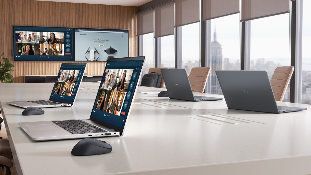 Dell 14 Plus Laptops lined up on a desk