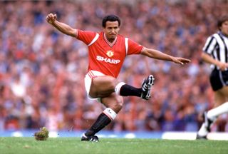 Remi Moses in action for Manchester United against Newcastle in 1984