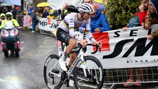 Tadej Pogacar of Slovenia and Team UAE Team Emirates competes in the rain ahead of the Tre Valli Varesine 2024 