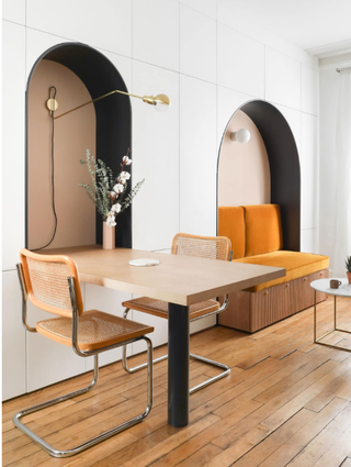 A small dining room with a folding table