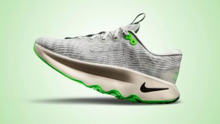 Nike Motiva running show on green background