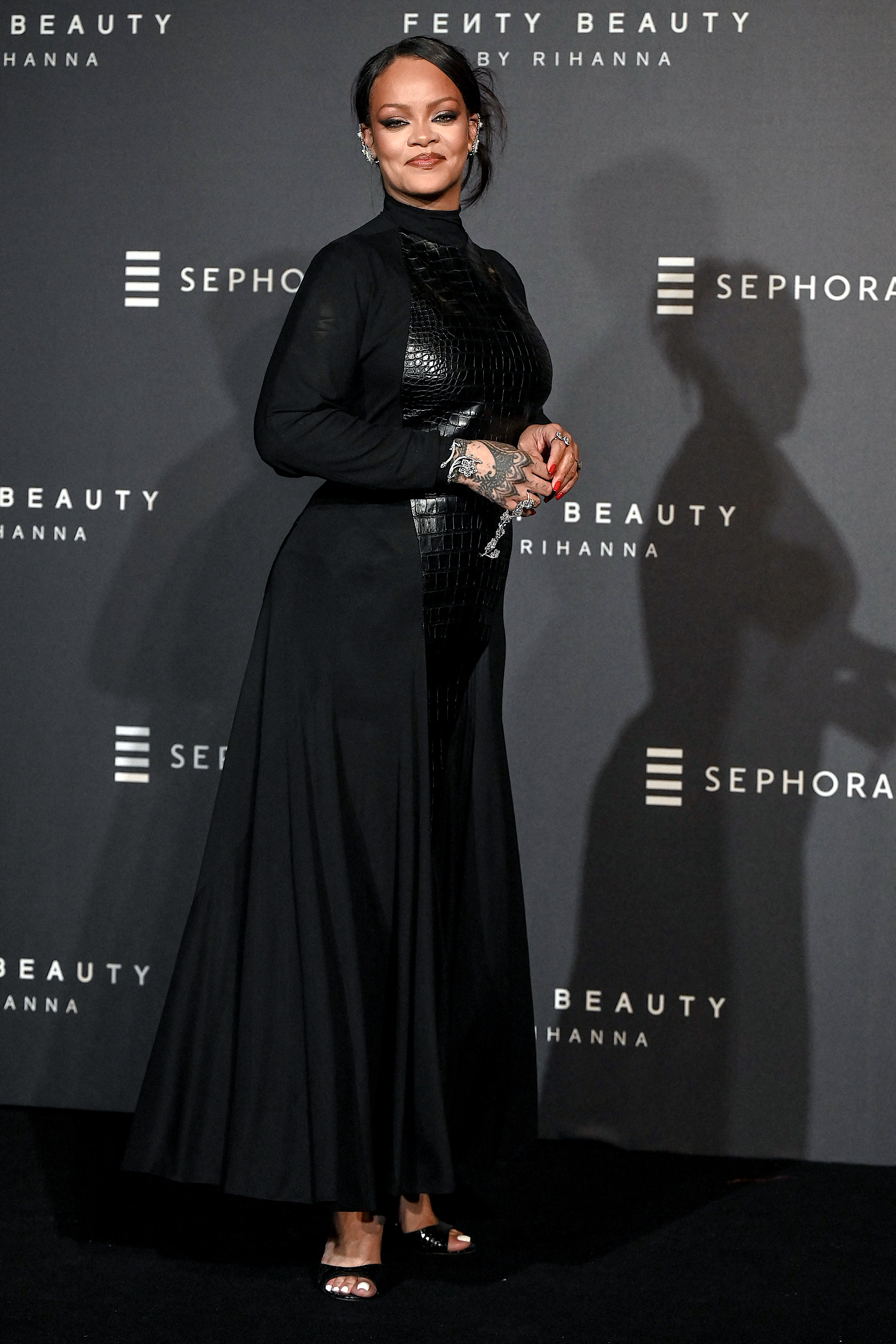 Rihanna Swaps Canary Yellow Mugler for Leather Ala&amp;iuml;a in Mumbai at Fenty launch