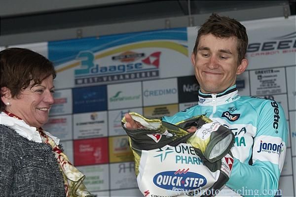 Michal Kwiatkowski (Omega Pharma-Quickstep) gets the race leader's jersey