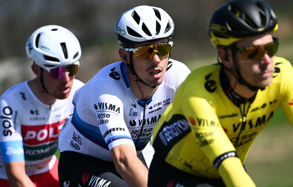 Team Visma-Lease a Bike's French rider Christophe Laporte (C) cycles during the 115th Milan-SanRemo one-day classic cycling race, between Pavia and SanRemo, on March 16, 2024. (Photo by Marco BERTORELLO / AFP)
