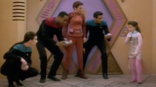 The crew watches a girl hopscotch on Deep Space Nine