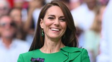 Catherine, Princess of Wales on Centre Court at Wimbledon 2023 wearing a green dress