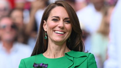 Catherine, Princess of Wales on Centre Court at Wimbledon 2023 wearing a green dress
