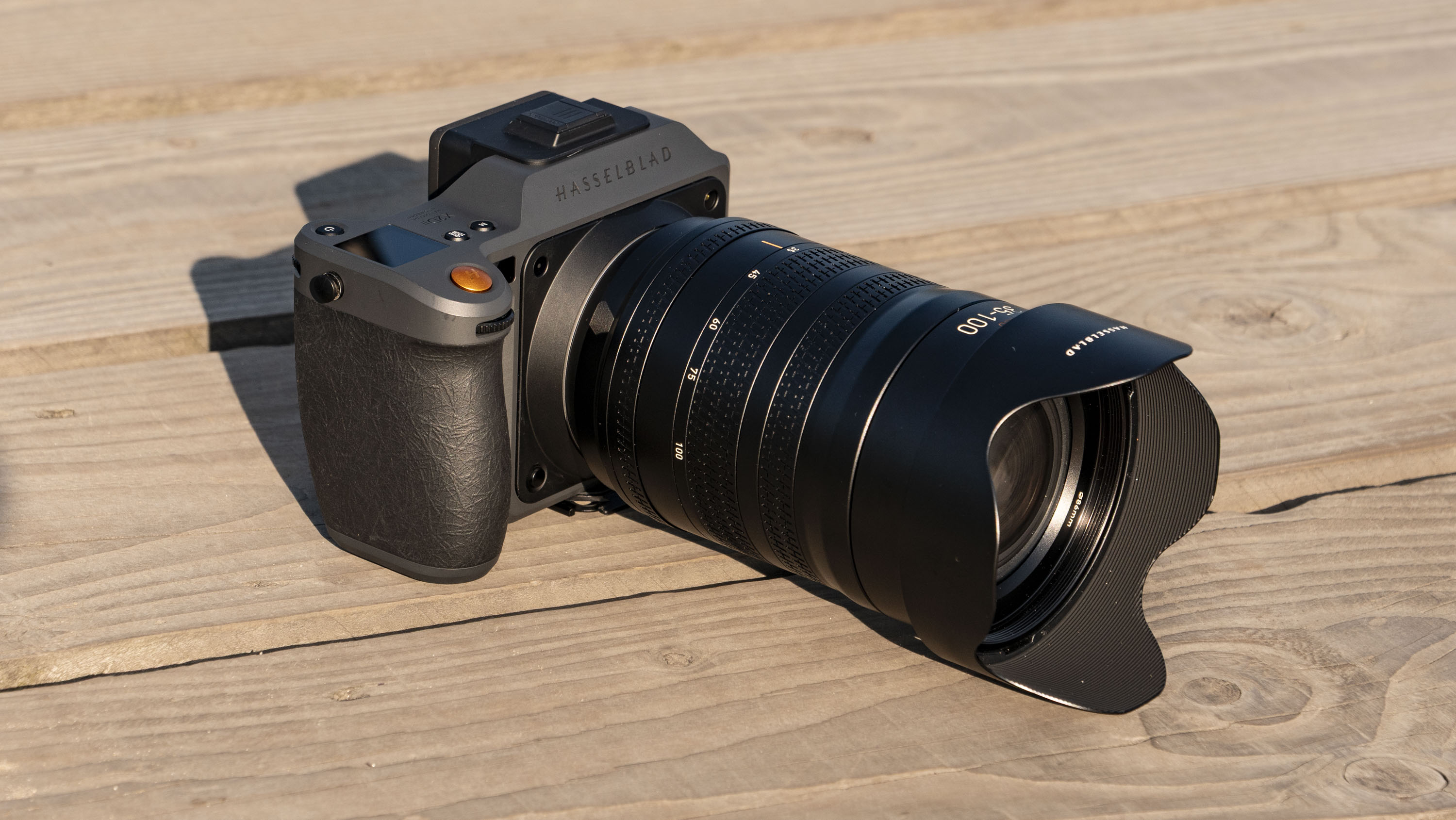 Hasselblad X2D II 100C camera outdoors at first light, with 35-100mm lens attached