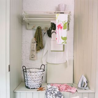 small utility room idea with extending drying rack