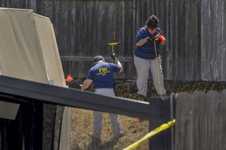 Law enforcement authorities look for evidence at the home of suspected “Golden State Killer” Joseph James DeAngelo in Citrus Heights, California, on Wednesday, April 25, 2018. 