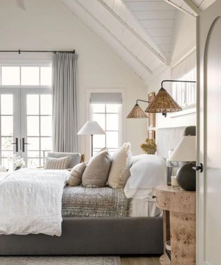 shiplap bedroom with neutral color scheme and layered textures