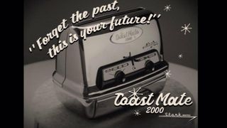 A black and white photo of a toaster, the text around reads "Forget the past, this is your future!" Toast Mate 2000 Stark Industry 