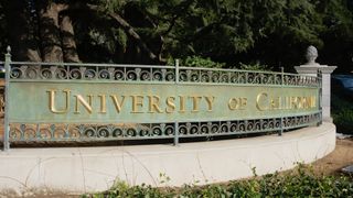 A decorative iron fence displaying the words University of California at the west entrance to the University of California, Berkeley
