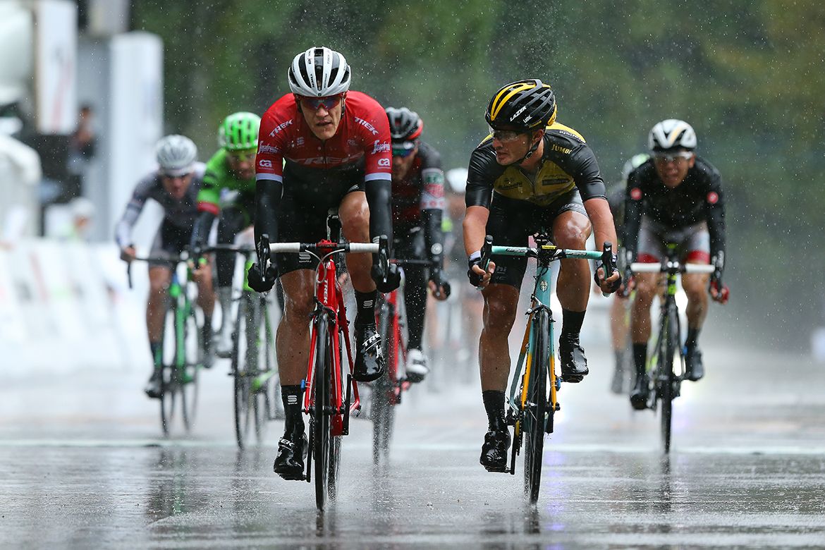 The rest of the riders cross the line
