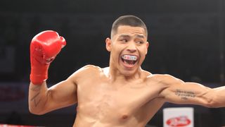 TIJUANA, MEXICO. - FEBRUARY 19: Diego Torres (L) punches his opponent Jonathan Escobedo Martinez(R) at Plaza Monumental February 19, 2022 in Tijuana, Baja California, Mexico. (Photo by Tom Hogan/Golden Boy Promotions via Getty Images)