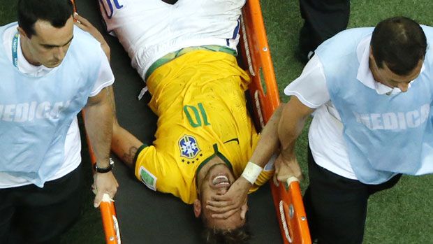 Neymar is carried off the pitch after being injured in Brazil&amp;#039;s quarter-final against Columbia