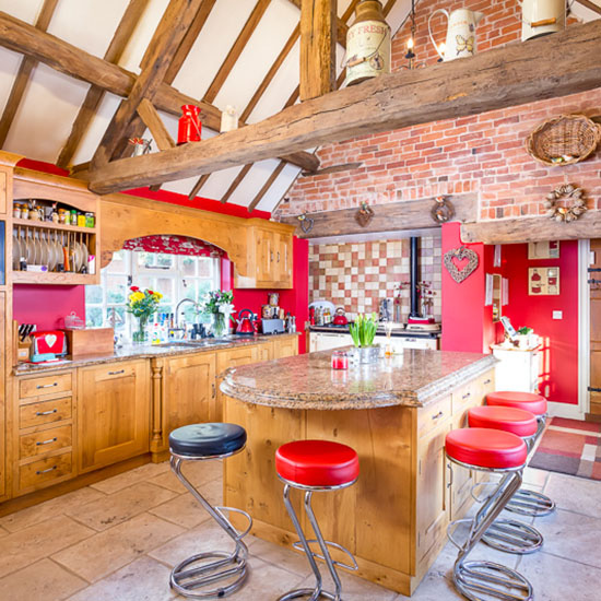 kitchen roof with wooden cabinets and counter