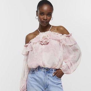 floral corsage off the shoulder top in pale pink