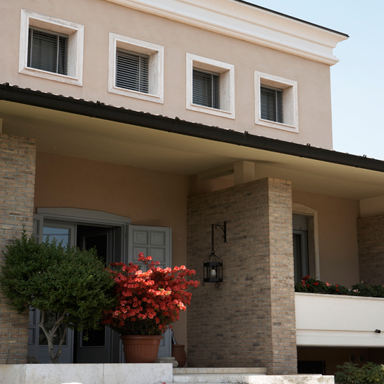 house exterior with pots