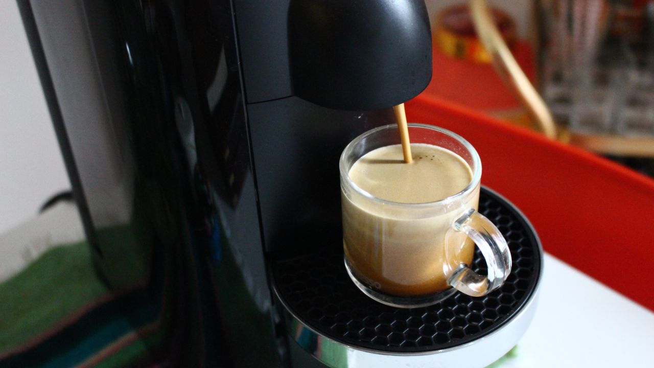 Nespresso Vertuo Plus coffee maker on kitchen counter