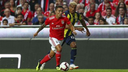 Benfica defender Alex Grimaldo in action against Turkish side Fenerbahce 