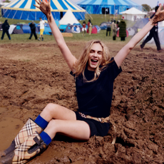 Cara Delevigne wears burberry to festival