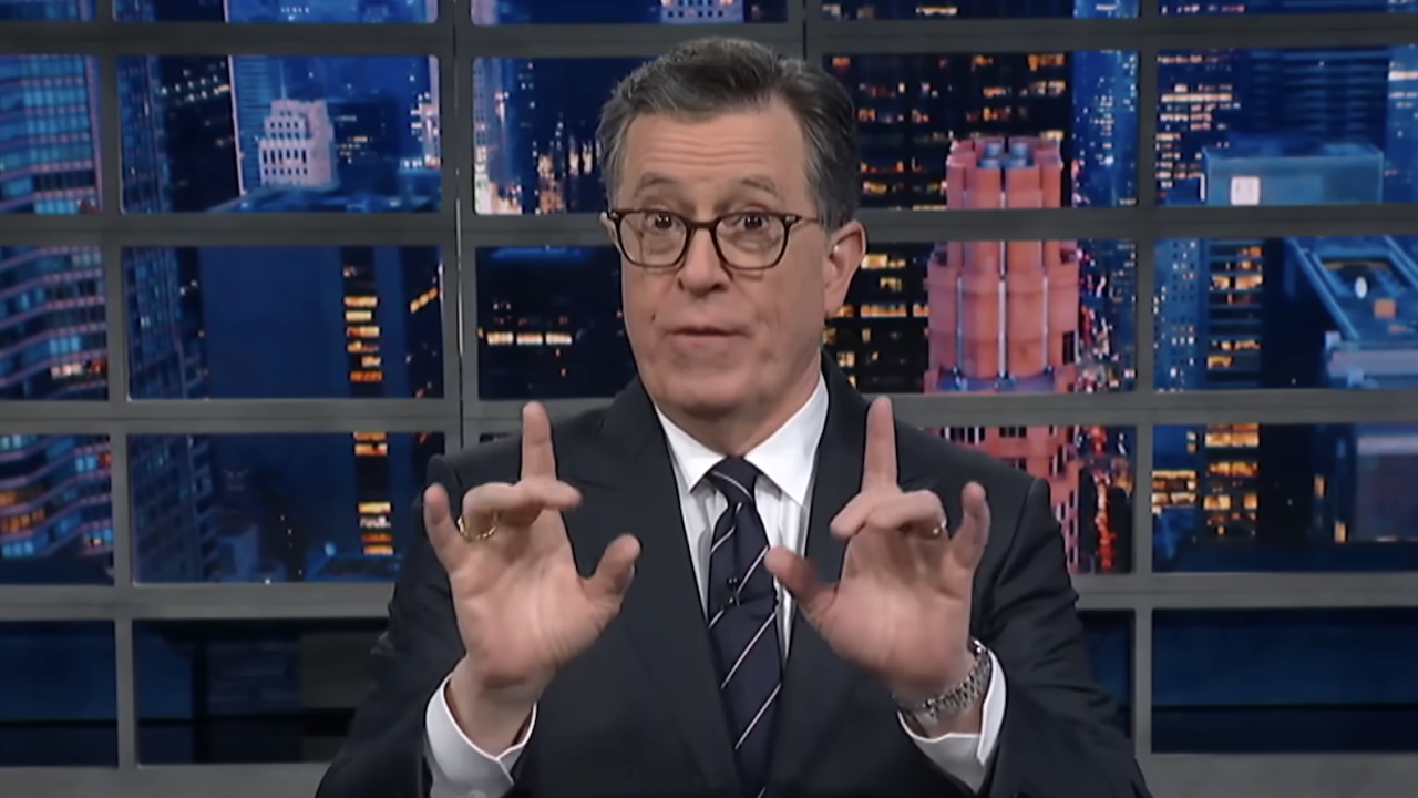 Stephen Colbert holding fingers up during monologue hosting The Late Show, April 9, 2026