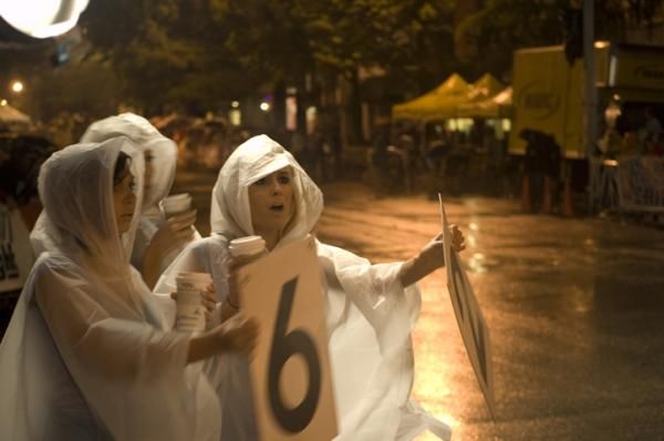 Six laps to go, say the caped volunteers.
