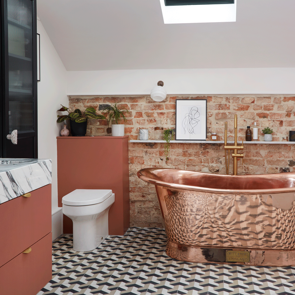 bathroom with red brick and white wall copper bathtub wall shelf and designed flooring