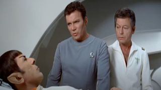 Spock is observed by Kirk and Bones