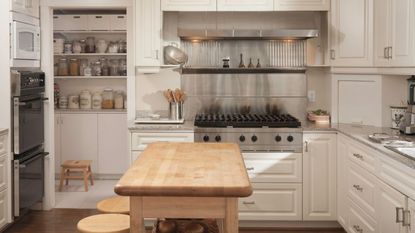 When does Prime Day end: A luxury kitchen in cream with a wooden island in the middle