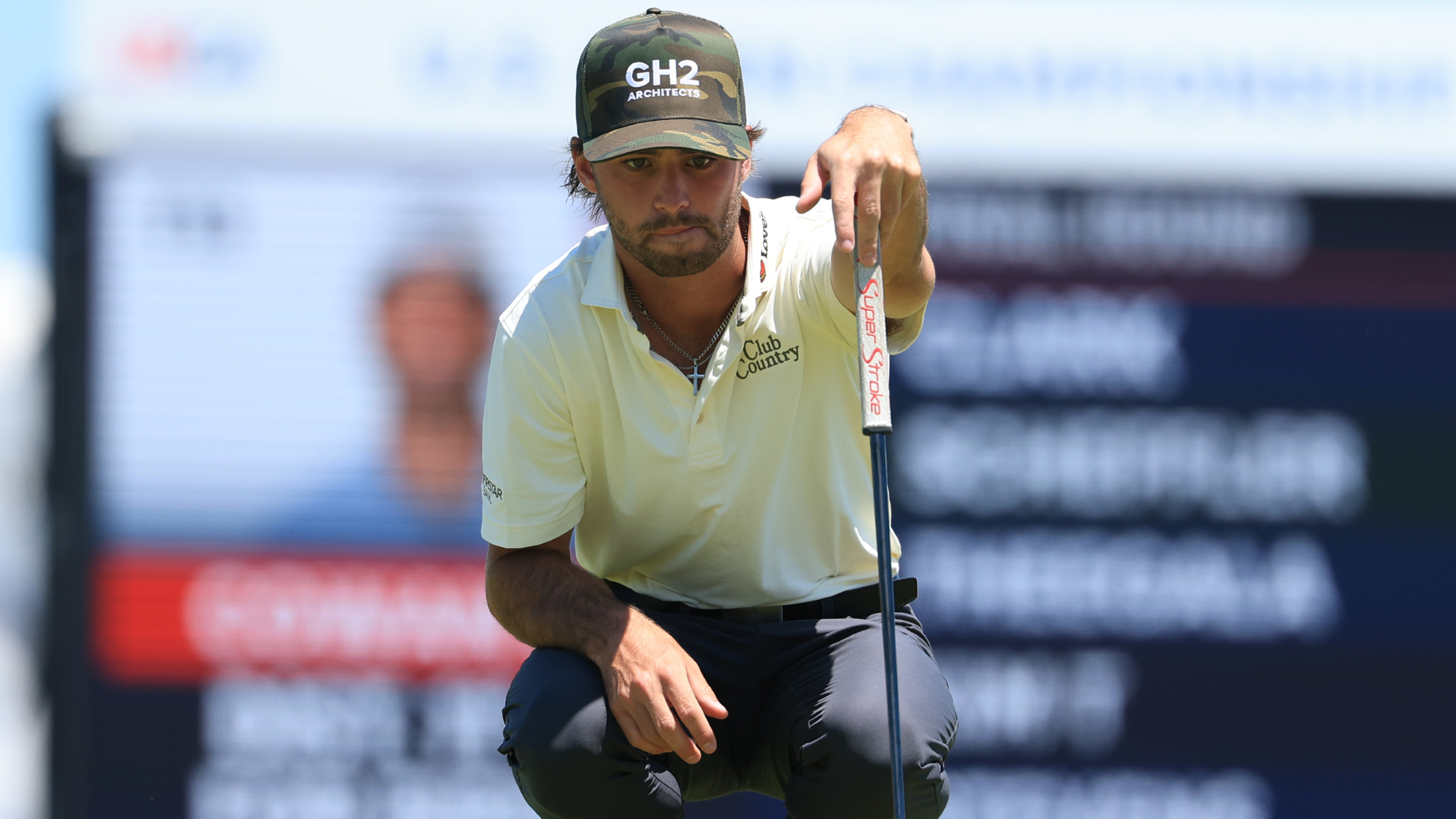 Ryder Cowan lines up a putt during the US Open
