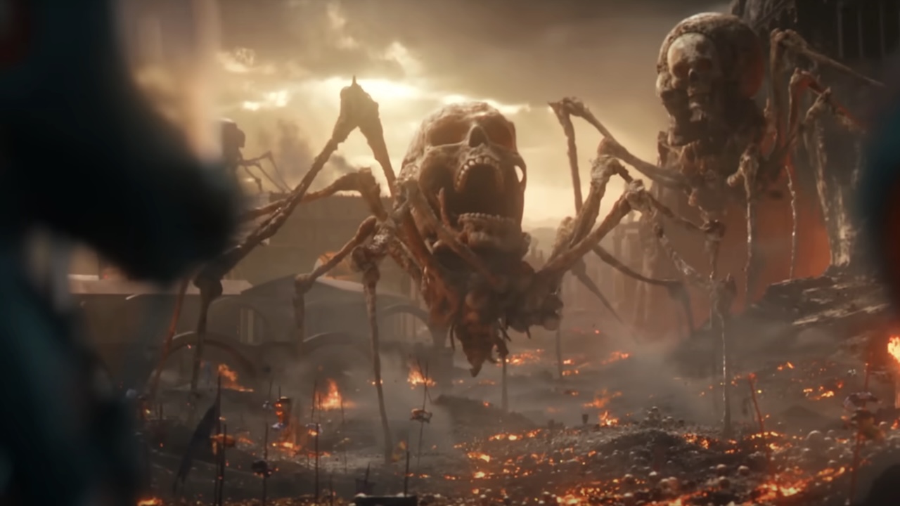 Giant spiders with equally giant human skulls on top of them walking around hellscape in Peacemaker Season 2 finale
