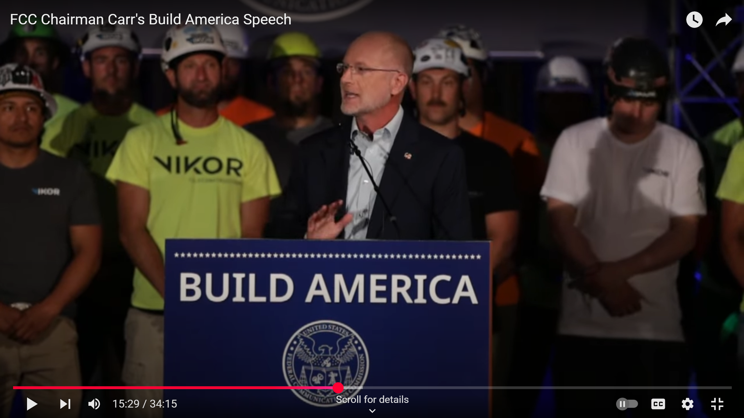 Brandan Carr speaking in front of tower workers in South Dakota. 