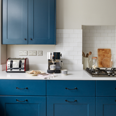 coffee machine on blue countertops