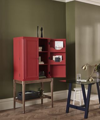 Red locker and olive green walls by Neptune