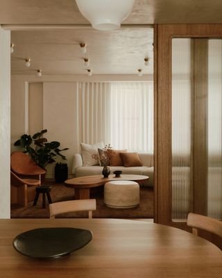 view through glass doors to living room at Upper West Side apartment by General Assembly
