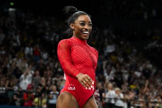 Simone Biles reacts after competing in the artistic gymnastics women's vault final during the Paris 2024 Olympic Games at the Bercy Arena in Paris, on August 3, 2024.