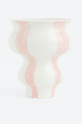 A pink and white striped vase